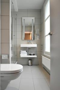 Koupelna v ubytování Mercure Paris Gare de l'Est + 59 fotografií