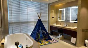 Galería fotográfica de New Century Grand Hotel Xi'an Xizang Building en Xi'an