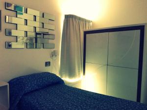 Postel nebo postele na pokoji v ubytování B&B San Francesco