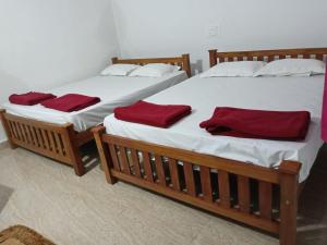 Katil atau katil-katil dalam bilik di Shree guru beach stay Gokarna