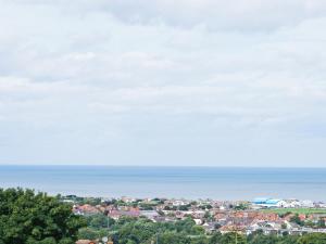 a view of a city and the ocean at Star Lodge in Rhyl