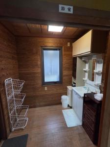 Koupelna v ubytování かんさんのお宿 + 10 fotografií