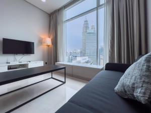 Μια τηλεόραση ή/και κέντρο ψυχαγωγίας στο Soho Suites KLCC by GuestHouse