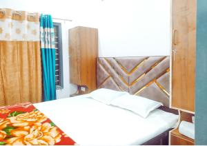 เตียงในห้องที่ SKYLINE HOMESTAY -Your Affordable Stay +4 ภาพ