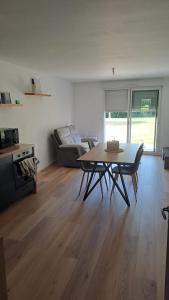 Posezení v ubytování Alexandre + 2 fotografie