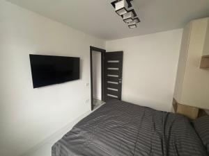 Ένα ή περισσότερα κρεβάτια σε δωμάτιο στο Hypnotic suite centru