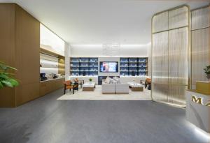 Χώρος καθιστικού στο Imperial Dragon Bay Mandala Hotel