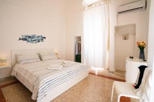 Postel nebo postele na pokoji v ubytování Modì