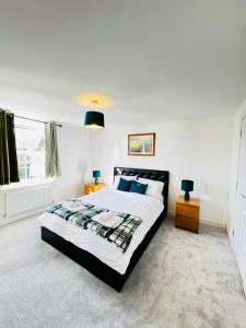 Katil atau katil-katil dalam bilik di Cozy Stays Taunton