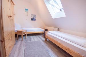 Voodi või voodid majutusasutuse Hamburger Str 24 FeWo Möwe 4 toas