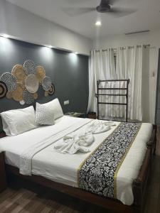 Giường trong phòng chung tại Mistygreen Homestay Thekkady