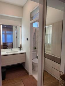 Koupelna v ubytování The Sakura House - Casa 99 Bandung + 21 fotografií