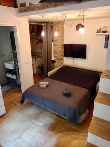 a bedroom with a large bed in a room at Penthouse in central Milan in Milan