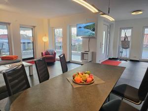 TV/trung tâm giải trí tại Ferienhaus Salzhaffblick