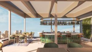 a rendering of a restaurant with tables and chairs at Hilton Garden Inn Chania City in Chania Town