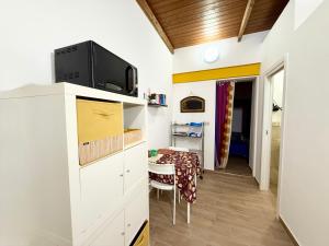 Kuchyň nebo kuchyňský kout v ubytování Vicolo Giardi