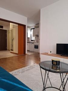 Televisyen dan/atau pusat hiburan di Apartman Atlas