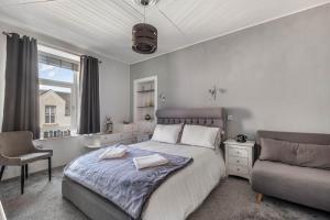 Ένα ή περισσότερα κρεβάτια σε δωμάτιο στο Herons Riverview