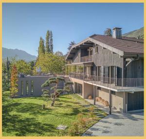 a large house with a yard and a building at Maison Gokan I Grand Annecy in Sévrier