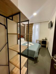 Giường trong phòng chung tại STYLE HOTEL