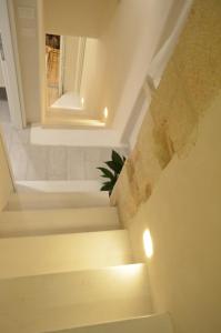 a view of a staircase in a building at dimore cieli di dante in Conversano