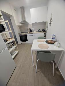 Kuchyň nebo kuchyňský kout v ubytování Acapulco Apartamento cerca de Santa Cruz y del mar