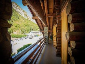 a view from the porch of a cabin with a view of a beach at Apartment with Fireplace in Antey-Saint-André