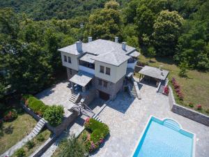 an aerial view of a house with a swimming pool at Villa Maria Amalia in Tsagarada