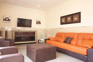 Posezení v ubytování AReH Apartamentos