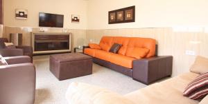 Posezení v ubytování AReH Apartamentos