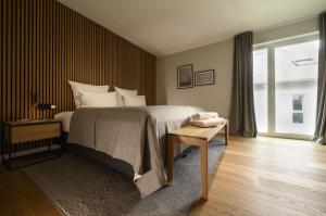 Postel nebo postele na pokoji v ubytování Ferienwohnung Bergblick 1342 in Oberammergau