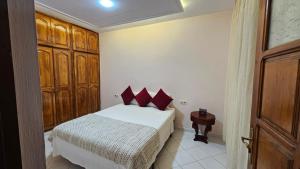 Postel nebo postele na pokoji v ubytování Dar Boujida