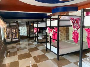 Ένα ή περισσότερα κρεβάτια σε δωμάτιο στο Mekong Backpackers +25 φωτογραφίες