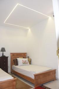 Ένα ή περισσότερα κρεβάτια σε δωμάτιο στο studio y&i