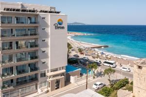 a view of a hotel and a beach at Hotel Riviera in Rhodes Town