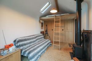 Postel nebo postele na pokoji v ubytování The Bothy