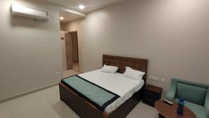 Postel nebo postele na pokoji v ubytování SHAGUN HOTEl