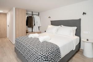 Postel nebo postele na pokoji v ubytování Vision Lavraga