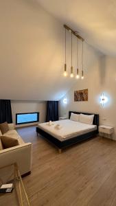 Giường trong phòng chung tại Riviera 990 Ambasador Adult only 15