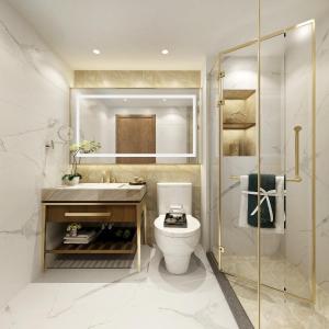 a bathroom with a toilet and a sink and a shower at Hotel Grand Villa Palce Near New Delhi IGI Airport in New Delhi
