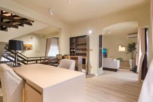 a living room with a kitchen and a dining room at Bethel in Lagos