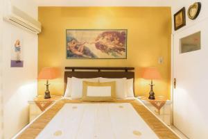 Кровать или кровати в номере Mini Paradise Salamina - Private Pool Retreat +10 фотографий