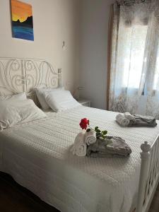 Postel nebo postele na pokoji v ubytování Villino Il Gelsomino - Relax e Natura