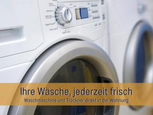 a washing machine with the words internet washer and detergent finish at Ferienhaus Höckelheim - FeWo Sternenhimmel - 100qm - 3 Schlafzimmer - bis 6 Gäste - Babies reisen gratis - Balkon, Garten & Grill - Klimaanlage, Raffstores & Fußbodenheizung - Smart-TV - Küche mit Induktionsherd & Spülmaschine - nahe Göttingen in Northeim