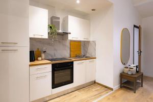Kuchyň nebo kuchyňský kout v ubytování 2P moderne proche Paris 4 pers