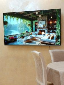 TV a/nebo společenská místnost v ubytování 3 Rooms of the Sun