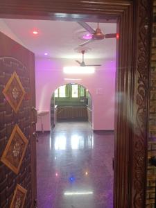 an empty room with a purple ceiling and a door at Homestay Tirupati 2bhk near Alipiri kapilathertham in Tirupati