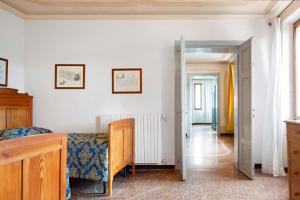 Postel nebo postele na pokoji v ubytování Villa Bivai