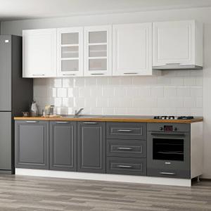a kitchen with gray and white cabinets and a stove at Sin House in Pamukkale