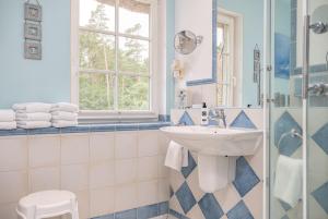 Koupelna v ubytování Dünenhaus Aurelia + 30 fotografií